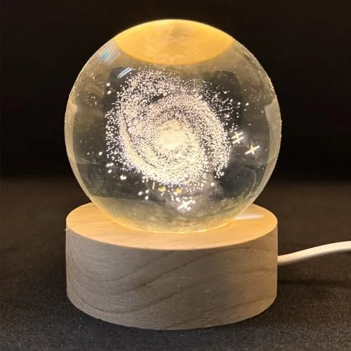 Esfera de cristal com galáxia